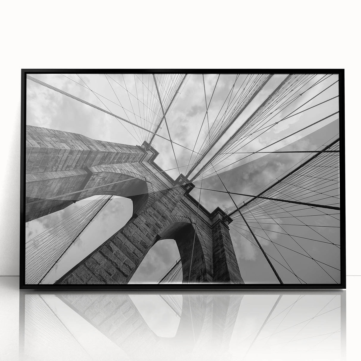 Large abstract wall art of the Brooklyn Bridge in muted black and gray tones, acrylic print, ideal for modern office decor.