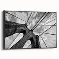 Black and white framed canvas of the Brooklyn Bridge in a vintage poster style, ideal for bedroom wall decor.