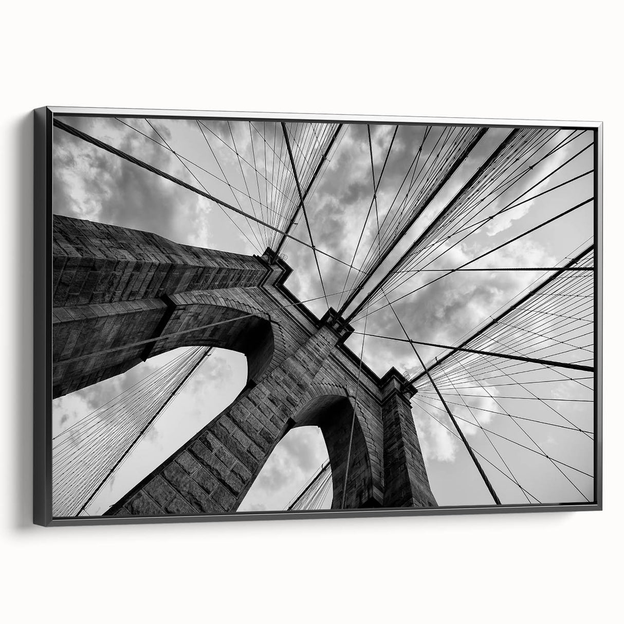 Black and white framed canvas of the Brooklyn Bridge in a vintage poster style, ideal for bedroom wall decor.