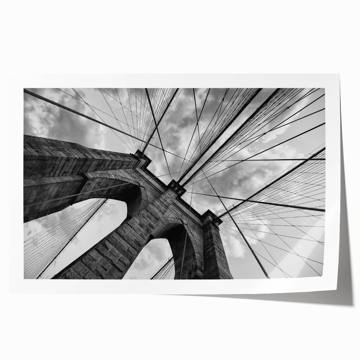 Rolled print of Brooklyn Bridge with muted gray tones, ideal for art wall dining room.