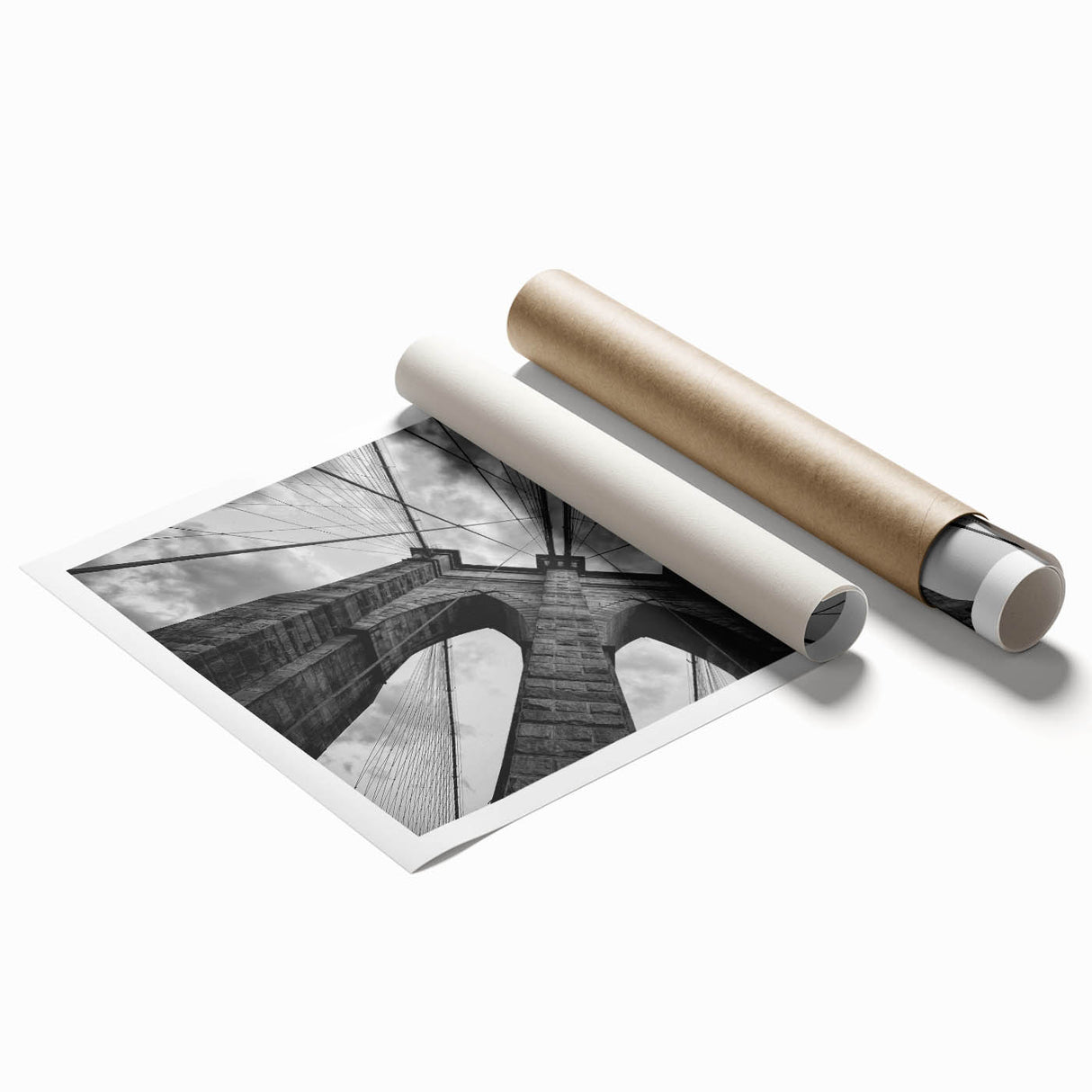 Rolled print of the Brooklyn Bridge in grayscale, ideal for classy bathroom wall art.