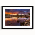Abstract art print of vibrant, textured colors representing Portland's scenery on a large black-framed canvas.