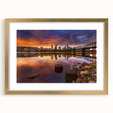Extra large abstract art print of Portland, Oregon, featuring textured layers in earth tones on a gold-framed canvas.