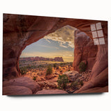Large abstract depiction of Utah's Arches on acrylic glass, in earthy red and orange tones.