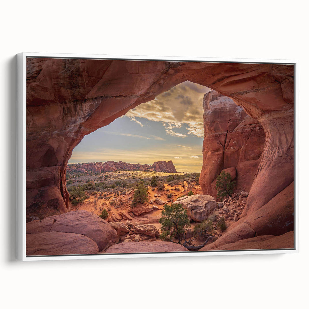 Vintage poster art of Arches National Park on framed canvas, featuring vibrant red and orange tones.