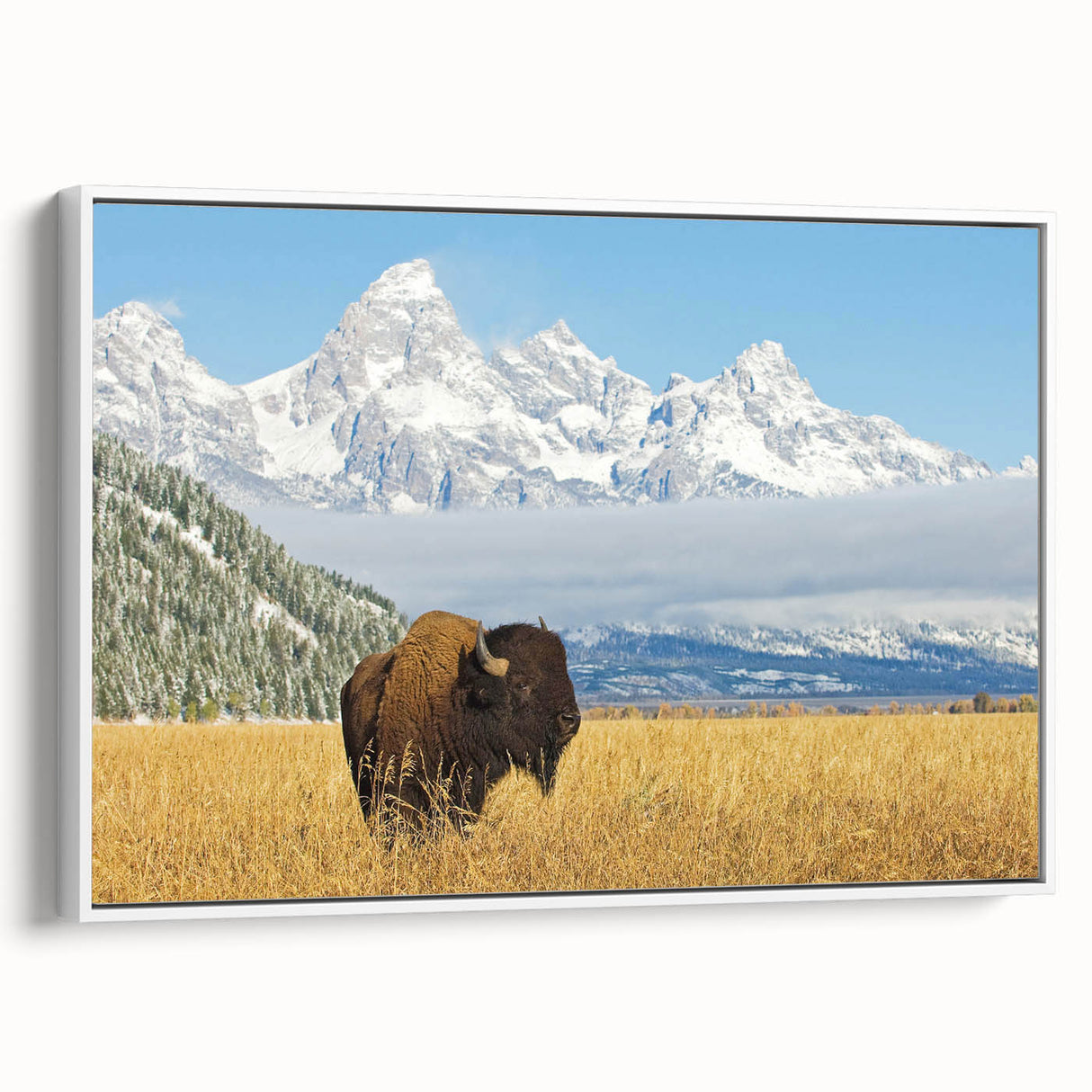 Vintage poster art of Grand Tetons on framed canvas, featuring a colorful palette, ideal for living room decor.