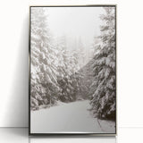 Mid-century modernist winter scene in muted blue and silver hues, acrylic print framed in silver.