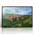 Framed acrylic artwork depicting dramatic cliffs in a landscape setting, featuring vibrant colors and sharp details, perfect for modern home decor.