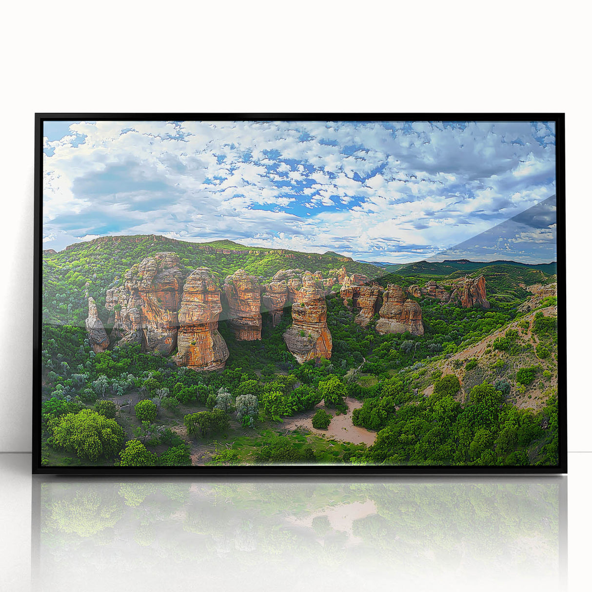 Framed acrylic artwork depicting dramatic cliffs in a landscape setting, featuring vibrant colors and sharp details, perfect for modern home decor.
