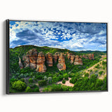 Framed canvas artwork depicting a stunning landscape with dramatic cliffs, showcasing vibrant colors and intricate details, designed to enhance any modern decor.