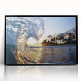 Framed acrylic artwork of a serene beach landscape, featuring vibrant blue skies and golden sands, showcased in a sleek black frame for modern decor.