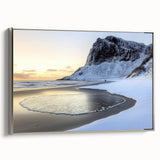Framed canvas artwork showcasing a serene beach landscape with silver accents, offering a tranquil coastal vibe for home decor, viewed from the side.