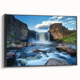 Framed canvas artwork depicting a stunning landscape of canyons, featuring rich earth tones and dramatic rock formations, showcased from a black side view. Ideal for enhancing home decor with natural beauty.