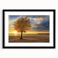 Landscape artwork of serene beaches framed in a sleek black mat, showcasing vibrant colors and tranquil ocean views, perfect for home decor and relaxation.