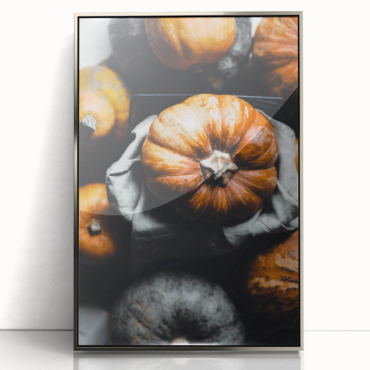 Mid-century modernist art featuring an abstract fall scene in warm orange and brown tones on a framed acrylic print.