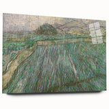 Large abstract wall art on acrylic glass depicting vibrant, swirling blue and yellow patterns.