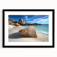 Black-framed landscape artwork depicting serene beaches, featuring a white mat for a polished look, ideal for home decor or beach-themed interiors.