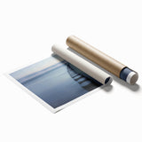 Rolled canvas print showcasing a stunning landscape bridge design, featuring vibrant colors and intricate details, safely packaged in a protective cardboard tube.