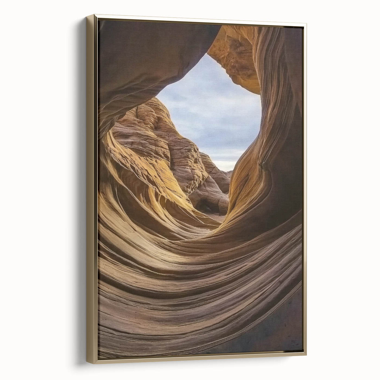 Framed canvas artwork showcasing a stunning canyon landscape with golden tones, emphasizing depth and texture, perfect for enhancing home decor aesthetics.