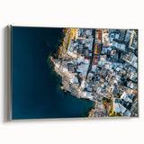 Framed canvas artwork depicting a scenic landscape of cliffs with a silver border, showcasing a serene view ideal for modern home decor, enhancing interior aesthetics.