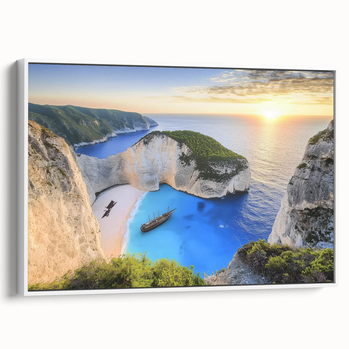Framed landscape canvas artwork showcasing a serene beach scene with soft waves and a vibrant sunset, elegantly displayed with a white frame and side view perspective. Perfect for coastal decor enthusiasts seeking tranquility in their interior spaces.