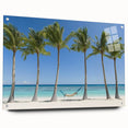Acrylic glass artwork depicting a serene beach landscape with vibrant colors and intricate details, showcased from a side view, secured with decorative pins.