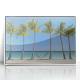 Framed acrylic artwork showcasing a serene beach landscape with vibrant colors, set against a crisp white frame, perfect for coastal-themed decor.