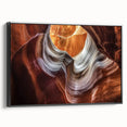 Framed landscape canvas artwork depicting vibrant canyons in rich earth tones, showcasing intricate textures and details, with a sleek black frame enhancing its aesthetic appeal. This piece serves as a stunning focal point for home decor.