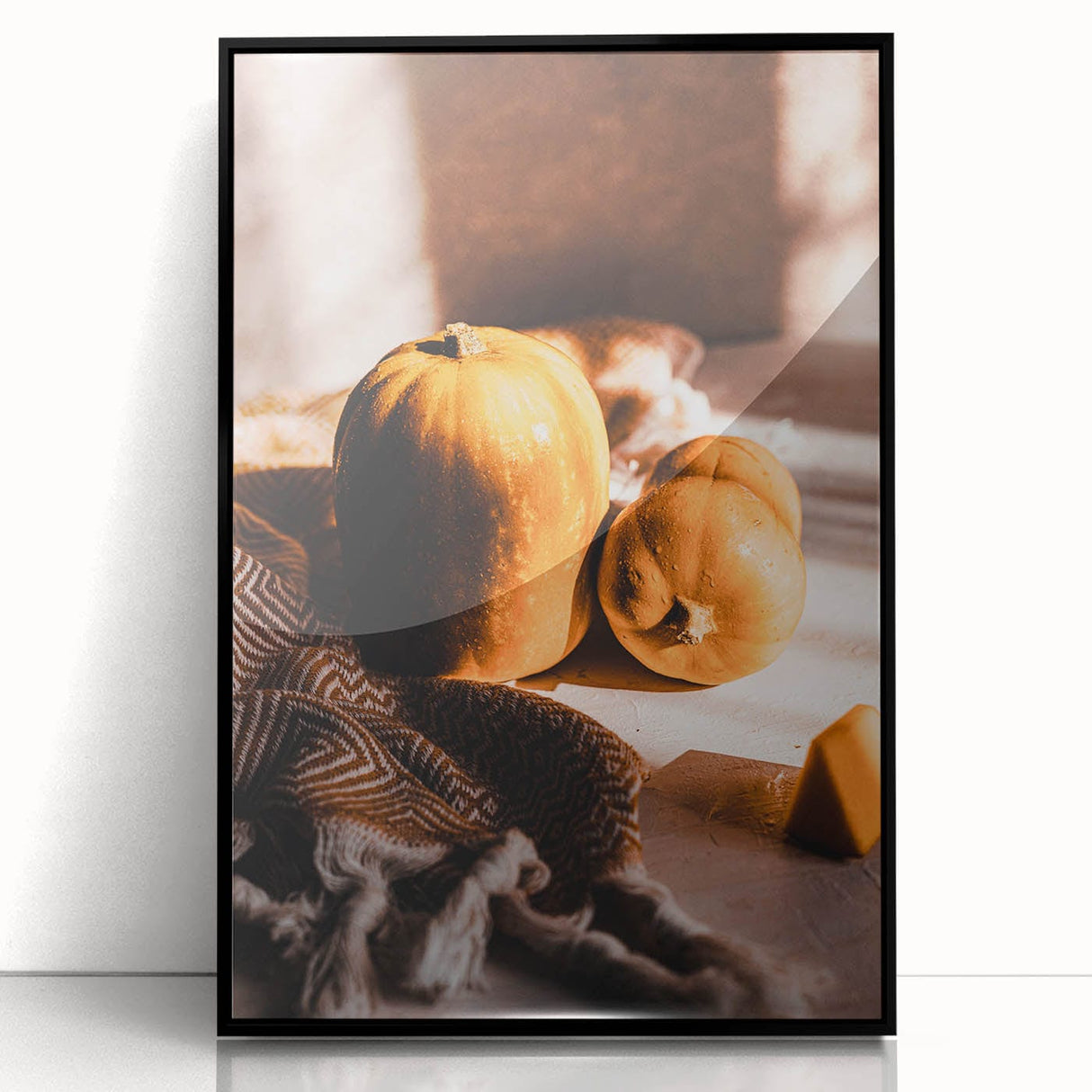 Large abstract wall art depicting fall foliage in mid-century modernist style, framed in black acrylic.