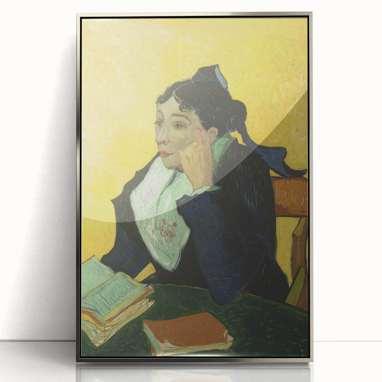 Large art print of Van Gogh's Starry Night in a silver frame on acrylic, displaying vibrant blues and yellows.