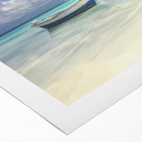Rolled canvas artwork showcasing a vibrant beach landscape design, featuring vivid colors and serene ocean waves, packaged securely in a protective cardboard tube.