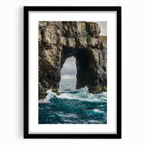 Black-framed landscape artwork showcasing dramatic cliffs against a serene sky, beautifully matted for an elegant presentation, perfect for home decor.