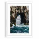 Framed landscape artwork depicting majestic cliffs in vibrant colors, set against a white mat, ideal for home décor or gallery display, enhancing any space.