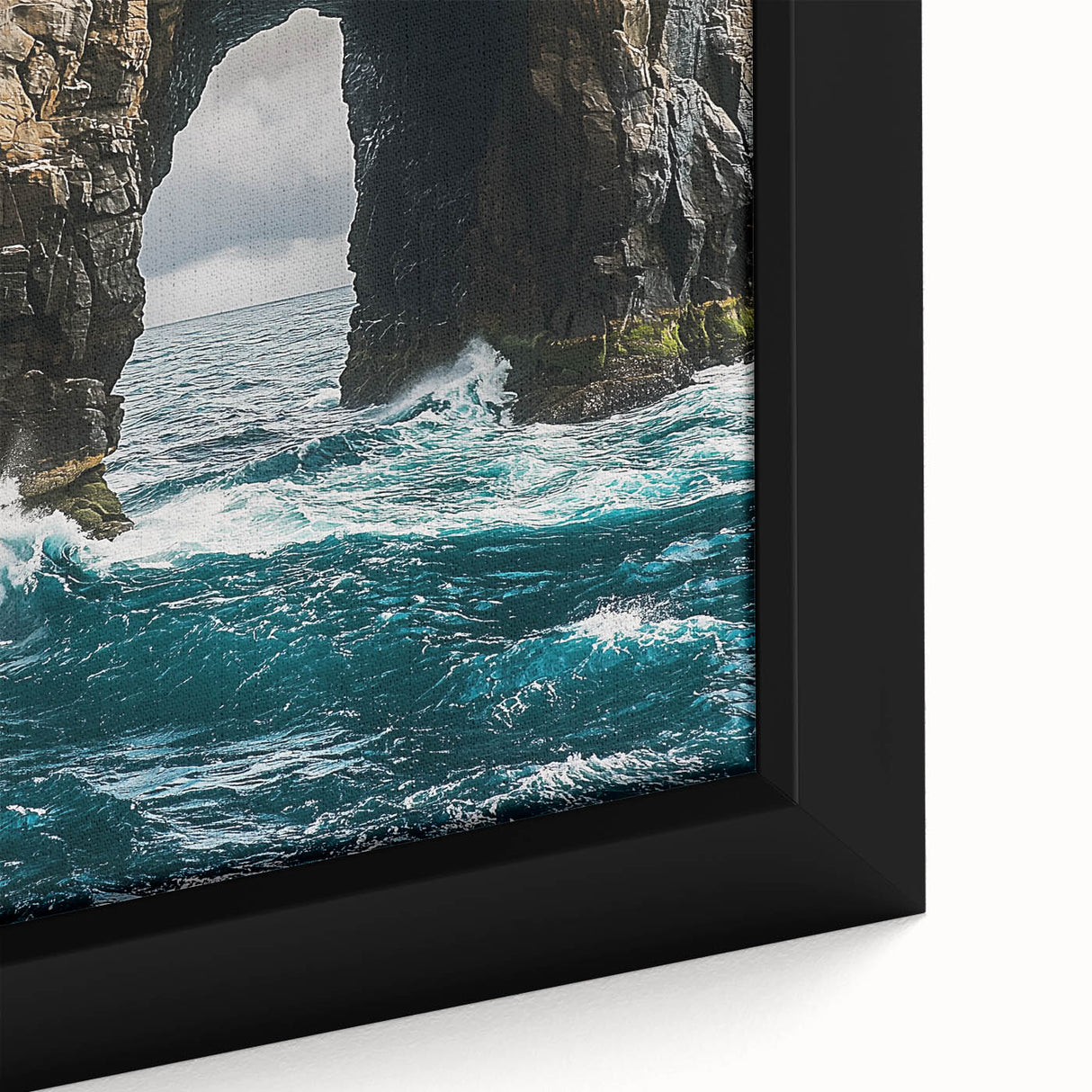 Close-up of a framed canvas artwork depicting dramatic cliffs and vibrant landscapes, showcasing rich colors and intricate details, perfect for home decor.