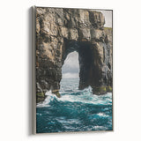 Framed canvas artwork showcasing a breathtaking view of rugged cliffs against a vibrant sky, featuring a sleek silver frame that enhances the landscape's beauty. Perfect for home decor.