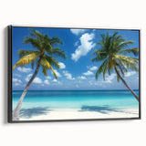 Framed landscape canvas artwork depicting serene beaches with vibrant blue skies and golden sands, featuring a sleek black frame and side view for aesthetic appeal.
