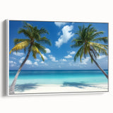 Framed landscape canvas depicting serene beach scene with soft blue waves and golden sand, showcasing a modern white frame profile. Perfect for coastal decor.