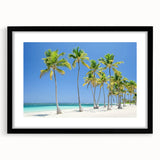 Black-framed landscape artwork depicting a serene beach scene, featuring soft waves and golden sand, designed to enhance interior decor and evoke tranquility.