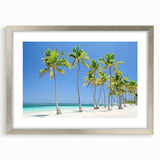 Silver-framed landscape artwork featuring a serene beach scene with vibrant colors, elegantly matted for display, ideal for home decor or coastal-themed interiors.
