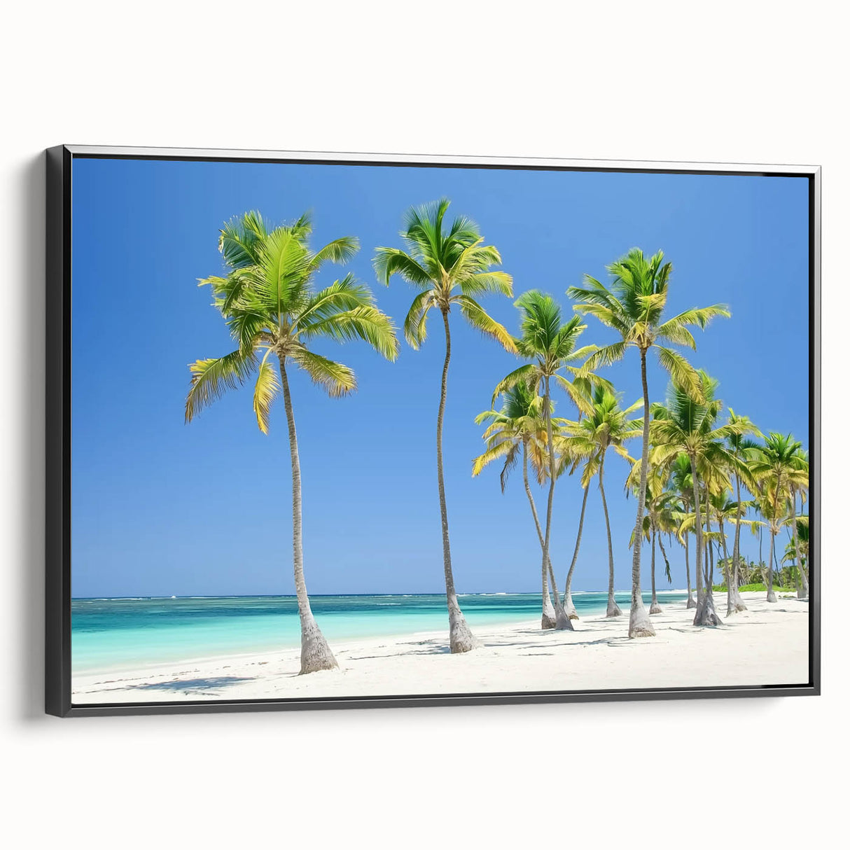 Framed landscape canvas art depicting serene beaches, featuring a black frame and side view that highlights its elegant design, perfect for home decor.
