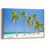 Framed canvas artwork depicting a serene beach landscape with vibrant colors, featuring a silver frame and side view that highlights its stylish design.