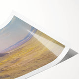 Landscape print of colorful canyons on rolled canvas, showcasing vibrant earth tones and intricate textures, ideal for home decor or art enthusiasts.