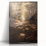 Mid-century modernist art depicting autumn trees in warm orange and yellow tones, framed in silver acrylic.