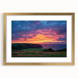Elegant gold-framed landscape artwork showcasing dramatic cliffs and serene scenery, complemented by a stylish mat, perfect for home decor and art enthusiasts.