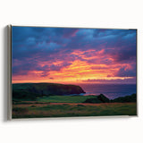 Framed canvas artwork depicting a scenic landscape of cliffs, showcasing vibrant colors and intricate details, presented in a sleek silver frame for an elegant touch.
