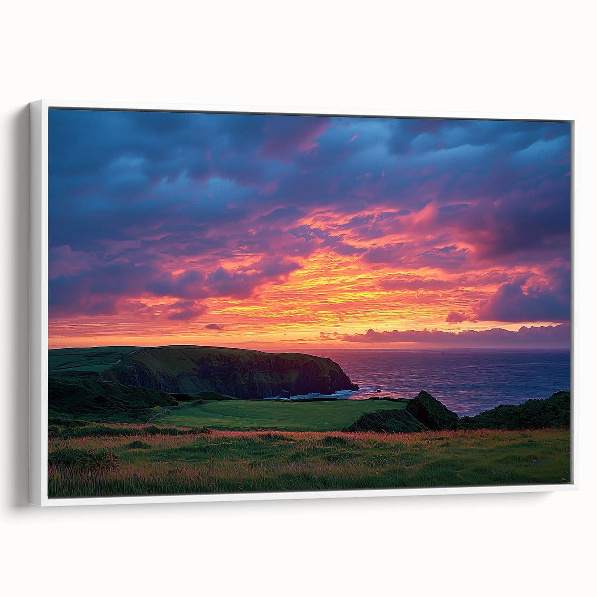 Framed canvas artwork depicting a stunning landscape of cliffs, showcasing vibrant colors and intricate details, with a sleek white frame enhancing its elegance. Perfect for home decor or art enthusiasts.
