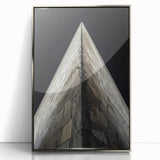 Mid-century modernist art depicting geometric shapes in muted tones on a framed acrylic, ideal for nursery wall decor.