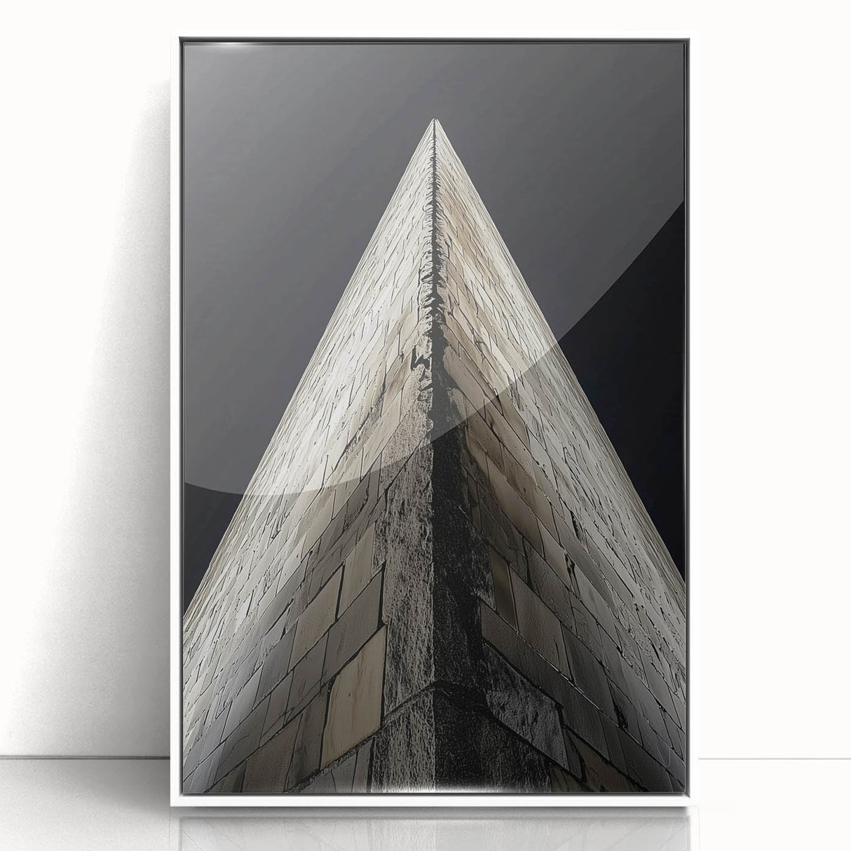 Art deco poster of geometric buildings in black and white tones on a framed acrylic, ideal for nursery wall art.
