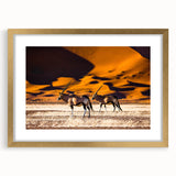 Textured art print of an abstract Namibian landscape in earth tones on a framed canvas, suitable for bedroom decor.