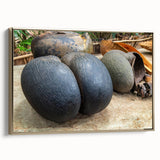 Framed canvas featuring a serene Seychelles landscape in muted gold and black tones, ideal for bedroom wall art.
